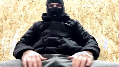 Masked Russian is jerking off in front of the camera