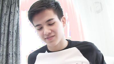 Cute twink is having fun in front of the camera