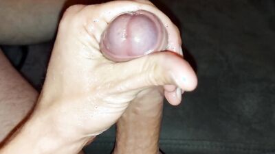 Close-up footage of a chap stroking his huge dong