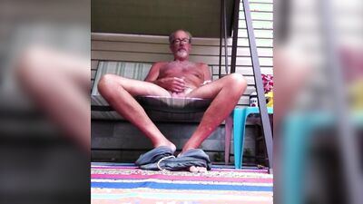 Perverted uncle is stroking his prick in front of the camera