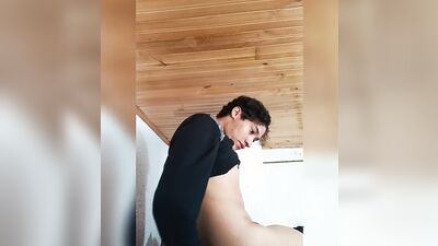 Amateur chap is playing with his genitals with legs lifted up
