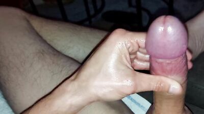 Amateur guy is stroking his huge dong in this close-up footage