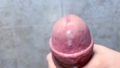 Hard cock is getting stroked in this close-up footage