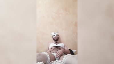 Masked sissy is having fun in front of the camera