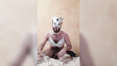 Masked sissy is having fun in front of the camera