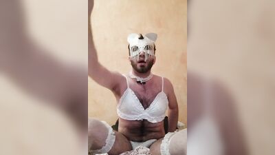 Masked sissy is having fun in front of the camera