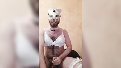 Masked sissy is having fun in front of the camera