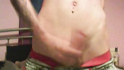 Redheaded chap is stroking his prick in front of the cam