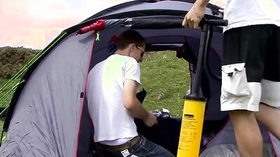 Luke and Brez are stroking each other's prick inside the tent