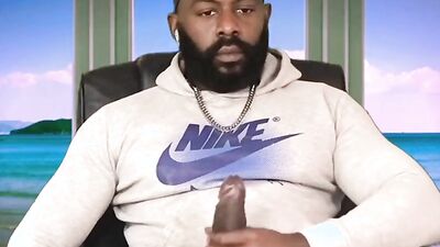Amateur African fellow is jerking his BBC in front of the cam