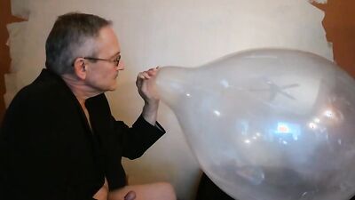 Naughty stepdad Jack is having fun with a huge balloon