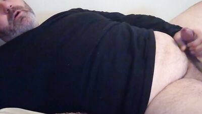 Amateur bear is stretching his pecker in front of the camera