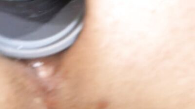 Close-up video of a chap stretching his pinky hole