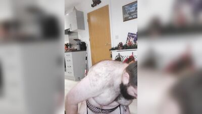 Chubby bearded bloke is having fun in front of the cam