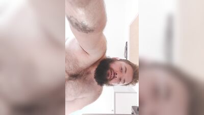 Chubby bearded bloke is having fun in front of the cam