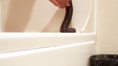 Amateur gay teen is playing with his gummy toy inside the bathroom