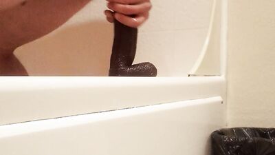 Amateur gay teen is playing with his gummy toy inside the bathroom