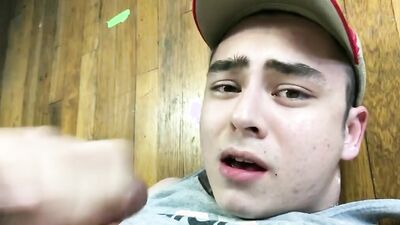 Cute college chap is stroking his pecker in front of the cam