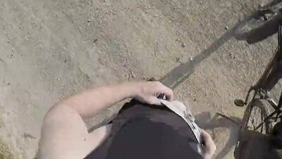 Amateur chap plays with his pecker while walking out in the open