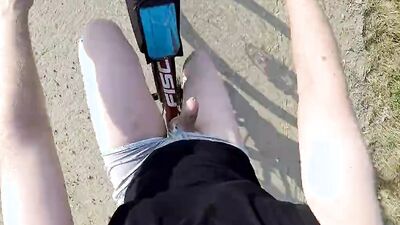 Amateur chap plays with his pecker while walking out in the open