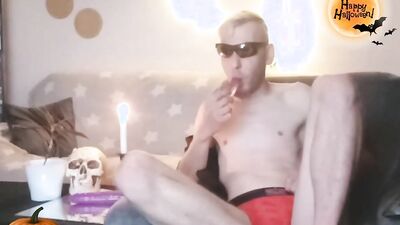 Perverted bloke plays with his hole while smoking a cigarette