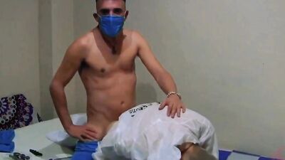 Horny masked dude is getting fornicated by his perverted gay doctor