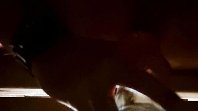 Close-up video of a bloke shoving coca cola bottle into his ass