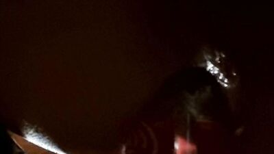 Close-up video of a bloke shoving coca cola bottle into his ass