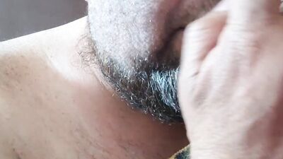 Perverted bearded chap is having fun in front of the camera