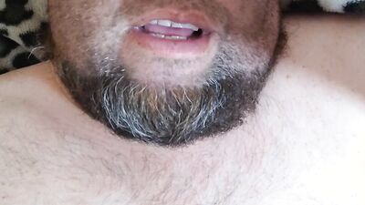 Bearded fellow is having fun in this close-up video
