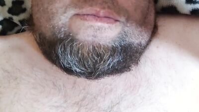 Bearded fellow is having fun in this close-up video