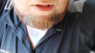 Amateur bearded bloke is filming himself in this close-up scene