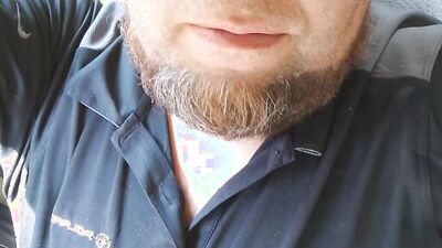 Amateur bearded bloke is filming himself in this close-up scene