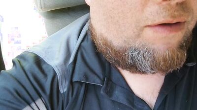 Amateur bearded bloke is filming himself in this close-up scene