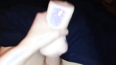 Close-up video of a chap stroking his dong with a gummy ring