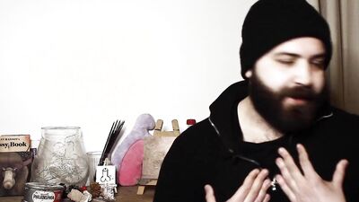 Armando Cabba is painting a nipple in this amateur footage