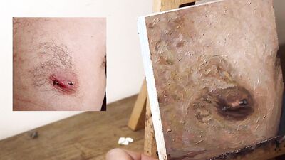 Armando Cabba is painting a nipple in this amateur footage
