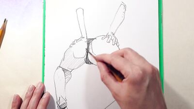 Close-up footage of a chap paining some ass cheeks