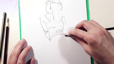 Close-up footage of a chap paining some ass cheeks