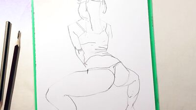 Close-up footage of a chap paining some ass cheeks