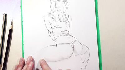 Close-up footage of a chap paining some ass cheeks