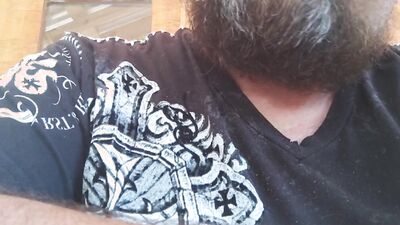 Bearded chap is having fun in this close-up homemade footage