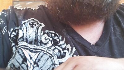 Bearded chap is having fun in this close-up homemade footage