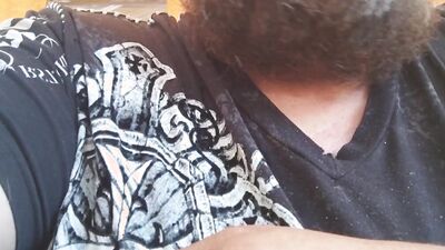 Bearded chap is having fun in this close-up homemade footage