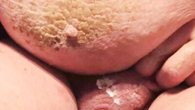 Amateur fatty is playing with tiny willy in this close-up footage