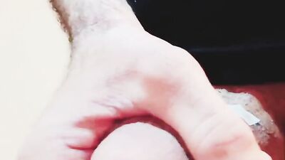 Close-up clip of a dude stroking hisnhard wood