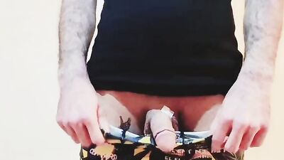 Close-up clip of a dude stroking hisnhard wood