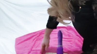 Masked sissy plays with his pinky toy in front of the cam