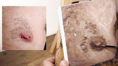 Armando Cabba is paintng a nipple in this homemade video