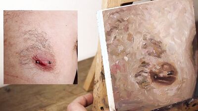 Armando Cabba is paintng a nipple in this homemade video